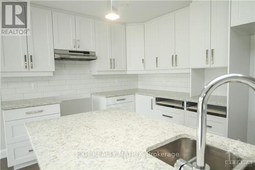 1401 Caroline Court, Cornwall, ON - Indoor Photo Showing Kitchen With Double Sink