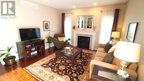 1280 Carfa Crescent, Kingston, ON - Indoor Photo Showing Living Room With Fireplace