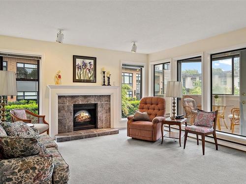 203-906 Southgate St, Victoria, BC - Indoor Photo Showing Living Room With Fireplace