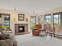 203-906 Southgate St, Victoria, BC  - Indoor Photo Showing Living Room With Fireplace 