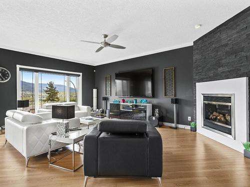 2753 Grandview Hts, Merritt, BC - Indoor Photo Showing Living Room With Fireplace