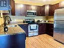 212 825 Gladstone Street E, Swift Current, SK  - Indoor Photo Showing Kitchen With Upgraded Kitchen 