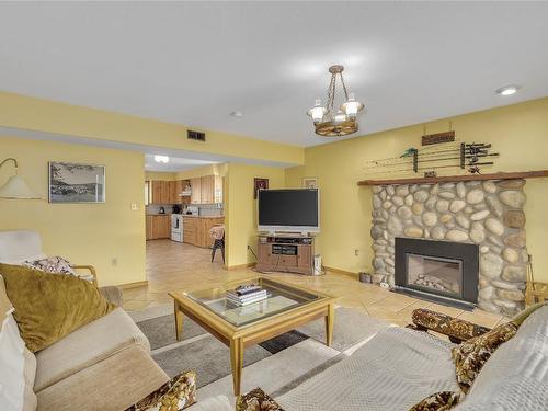 112 Round Lake Road, Princeton, BC - Indoor Photo Showing Living Room With Fireplace