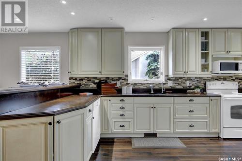 46 Greensboro Drive, Regina, SK - Indoor Photo Showing Kitchen With Double Sink