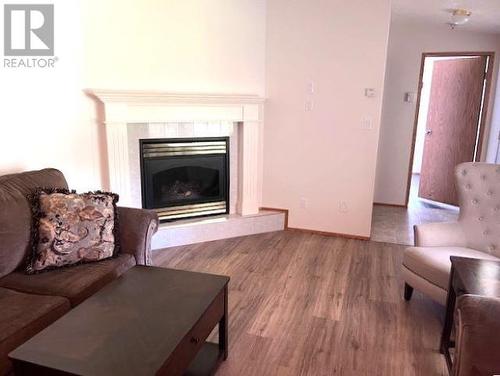 1767 Alder Road, Quesnel, BC - Indoor Photo Showing Living Room With Fireplace
