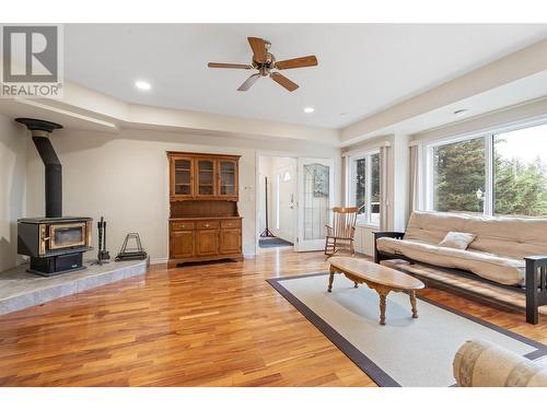 12857 Oyama Road, Lake Country, BC - Indoor Photo Showing Living Room With Fireplace