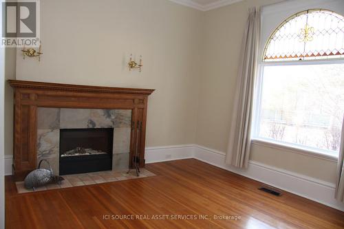 25 Beaconsfield Avenue, London, ON - Indoor Photo Showing Living Room With Fireplace