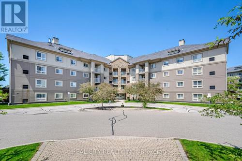 3406 - 4 Dayspring Circle, Brampton, ON - Outdoor With Balcony With Facade