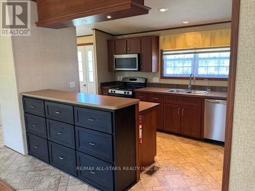 1 Creekside Circle, Kawartha Lakes, ON - Indoor Photo Showing Kitchen With Double Sink