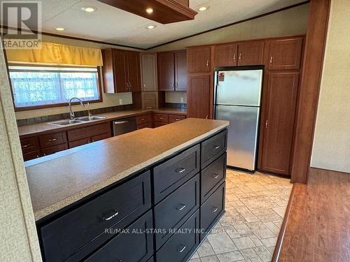 1 Creekside Circle, Kawartha Lakes, ON - Indoor Photo Showing Kitchen With Double Sink