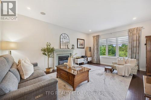 27 Charles Tilley Crescent, Clarington, ON - Indoor Photo Showing Living Room With Fireplace