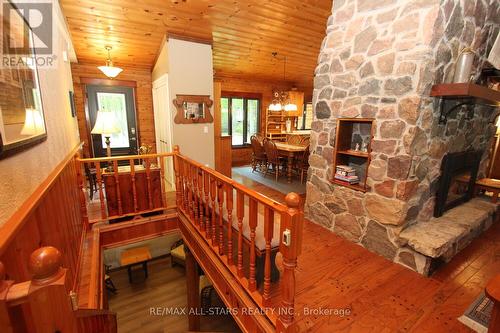 4 Reynolds Court, Kawartha Lakes, ON - Indoor Photo Showing Other Room With Fireplace
