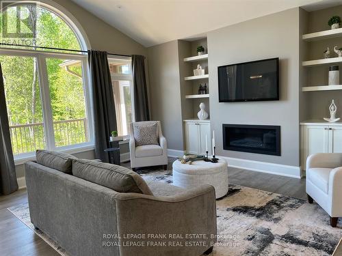 580 Patterson Road, Kawartha Lakes, ON - Indoor Photo Showing Living Room With Fireplace