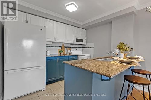 321 - 61 Clarington Boulevard, Clarington, ON - Indoor Photo Showing Kitchen With Double Sink