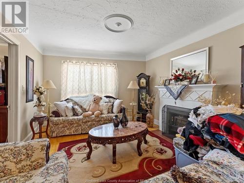 5929-39 Wyandotte, Windsor, ON - Indoor Photo Showing Living Room With Fireplace