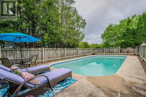 8292 Wilson Street, Guelph/Eramosa, ON - Outdoor With In Ground Pool With Backyard