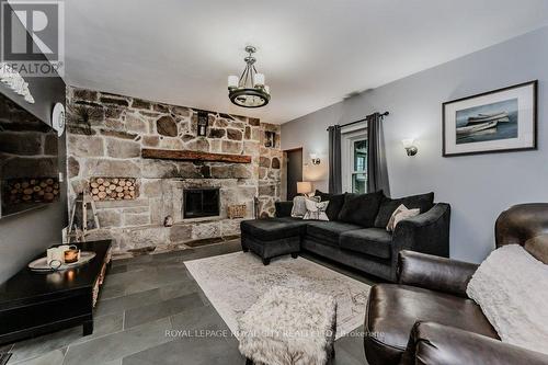 8292 Wilson Street, Guelph/Eramosa, ON - Indoor Photo Showing Living Room With Fireplace