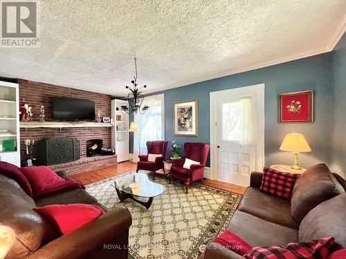 1500 Old Highway 2, Belleville, ON - Indoor Photo Showing Living Room With Fireplace