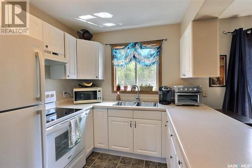 215 Vickers Crescent, Air Ronge, SK - Indoor Photo Showing Kitchen With Double Sink
