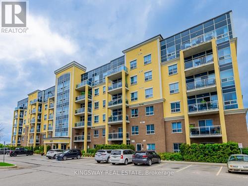 # 401 - 1421 Costigan Road, Milton, ON - Outdoor With Balcony With Facade