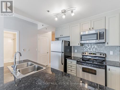 # 401 - 1421 Costigan Road, Milton, ON - Indoor Photo Showing Kitchen With Double Sink