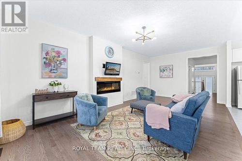 154 Ramblewood Drive, Wasaga Beach, ON - Indoor Photo Showing Living Room With Fireplace