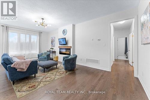 154 Ramblewood Drive, Wasaga Beach, ON - Indoor Photo Showing Living Room With Fireplace