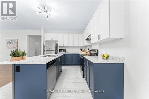 154 Ramblewood Drive, Wasaga Beach, ON - Indoor Photo Showing Kitchen With Double Sink With Upgraded Kitchen