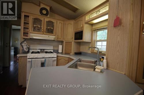 29 - 116 Cedardale Road, Brighton, ON - Indoor Photo Showing Kitchen With Double Sink