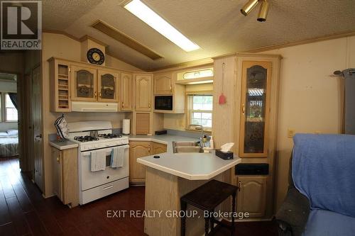 29 - 116 Cedardale Road, Brighton, ON - Indoor Photo Showing Kitchen With Double Sink