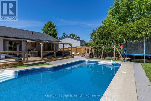 2242 Woodglade Boulevard, Peterborough, ON - Outdoor With In Ground Pool With Deck Patio Veranda With Backyard