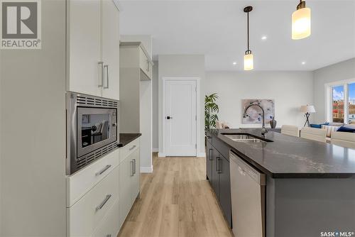 123 Leskiw Lane, Saskatoon, SK - Indoor Photo Showing Kitchen With Double Sink