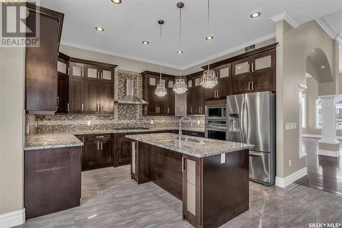 412 Nicklaus Drive, Warman, SK - Indoor Photo Showing Kitchen With Stainless Steel Kitchen With Double Sink With Upgraded Kitchen