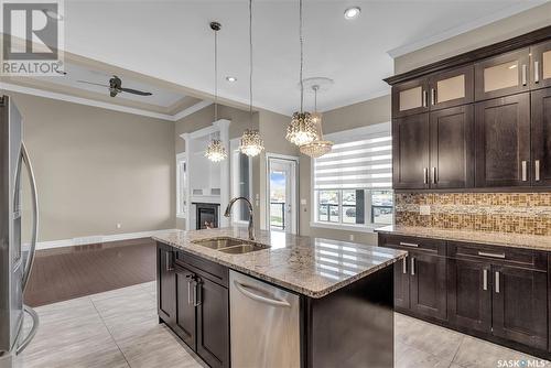 412 Nicklaus Drive, Warman, SK - Indoor Photo Showing Kitchen With Double Sink With Upgraded Kitchen