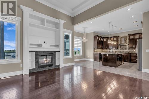 412 Nicklaus Drive, Warman, SK - Indoor Photo Showing Living Room With Fireplace