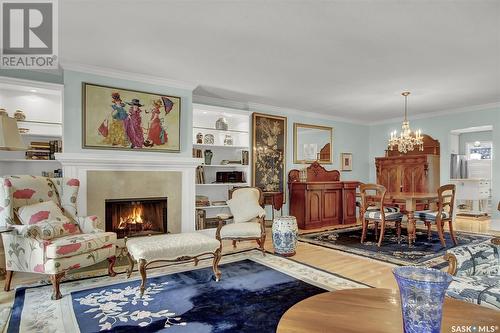 1134 Gryphons Walk, Regina, SK - Indoor Photo Showing Living Room With Fireplace