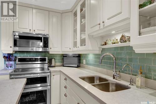 1134 Gryphons Walk, Regina, SK - Indoor Photo Showing Kitchen With Double Sink