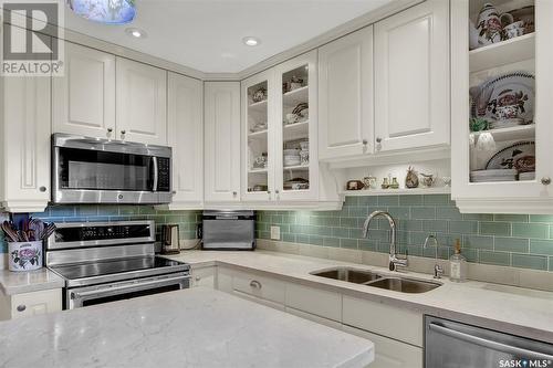 1134 Gryphons Walk, Regina, SK - Indoor Photo Showing Kitchen With Double Sink