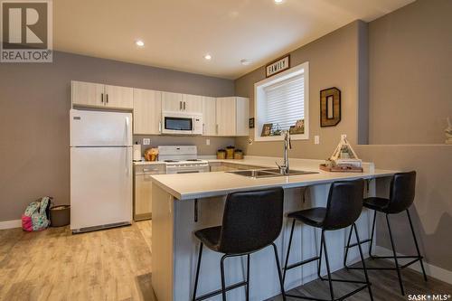 1103 Evergreen Boulevard, Saskatoon, SK - Indoor Photo Showing Kitchen With Double Sink