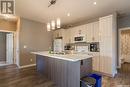 1103 Evergreen Boulevard, Saskatoon, SK  - Indoor Photo Showing Kitchen With Double Sink 