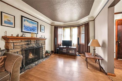 53 Queensdale Avenue E, Hamilton, ON - Indoor Photo Showing Living Room With Fireplace