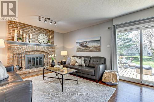 39 Sweetbriar Road, London, ON - Indoor Photo Showing Living Room With Fireplace