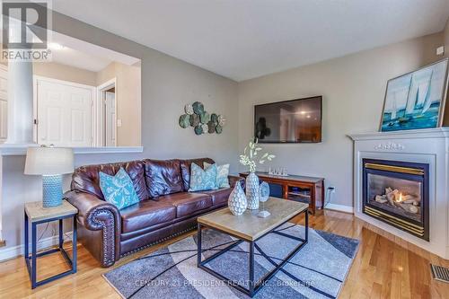 166 Russell Jarvis Drive, Markham, ON - Indoor Photo Showing Living Room With Fireplace