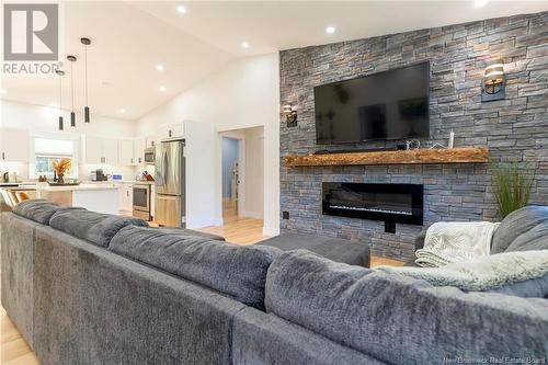 136 Lake Road S, Titusville, NB - Indoor Photo Showing Living Room With Fireplace