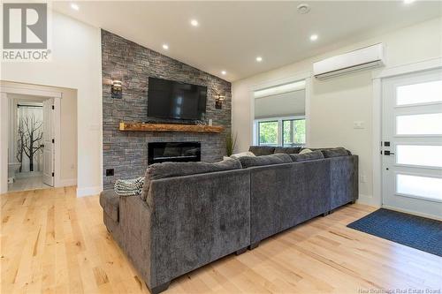 136 Lake Road S, Titusville, NB - Indoor Photo Showing Living Room With Fireplace