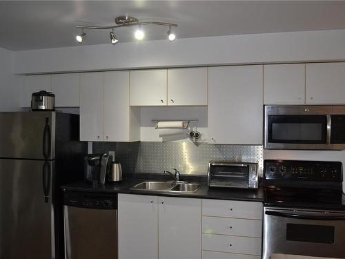 208-932 Johnson St, Victoria, BC - Indoor Photo Showing Kitchen With Double Sink