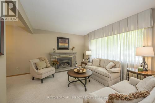 765 Notre Dame Drive, London, ON - Indoor Photo Showing Living Room With Fireplace