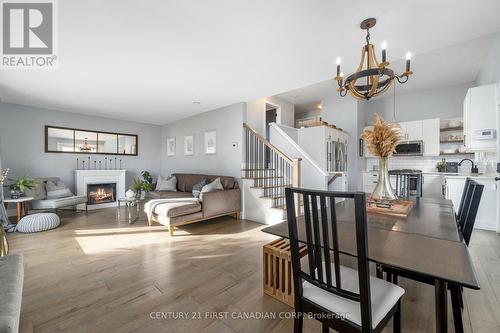 44 Elizabeth Crescent, Belleville, ON - Indoor Photo Showing Dining Room With Fireplace