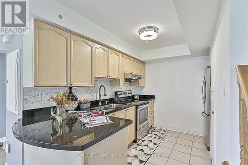 253 - 316 John Street, Markham, ON - Indoor Photo Showing Kitchen With Double Sink