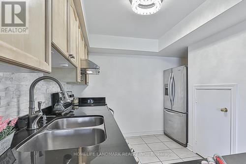 253 - 316 John Street, Markham, ON - Indoor Photo Showing Kitchen With Double Sink